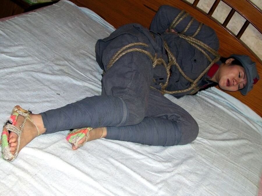 Free porn pics of Chinese soldier girl tied up with heavy rope 9 of 12 pics