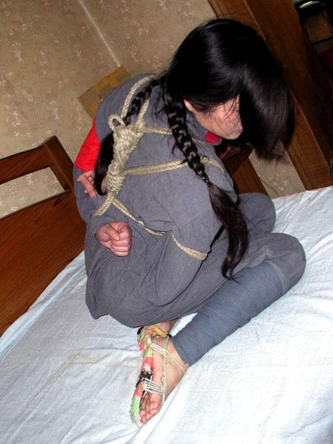 Free porn pics of Chinese soldier girl tied up with heavy rope 1 of 12 pics