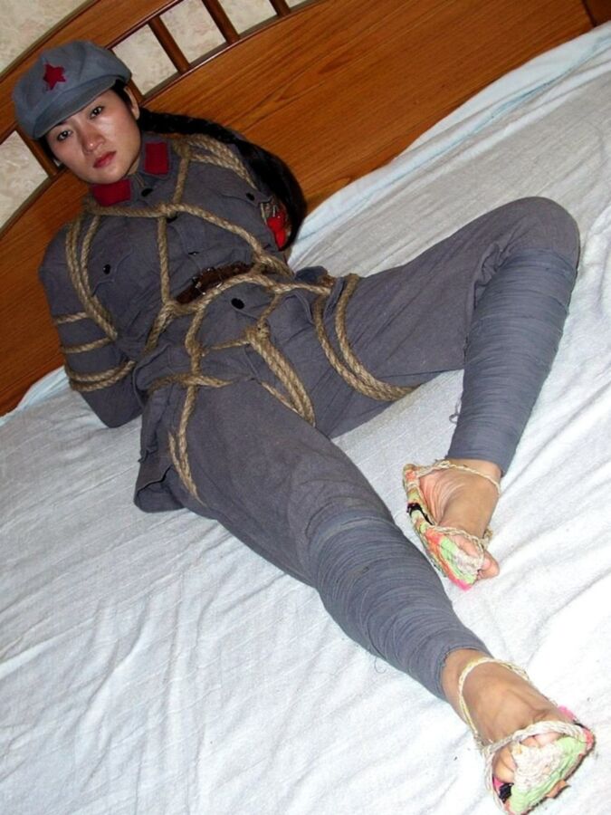 Free porn pics of Chinese soldier girl tied up with heavy rope 7 of 12 pics