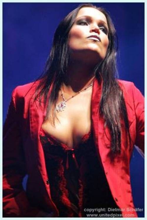 Free porn pics of Tarja Turunen's hot cleavage 7 of 8 pics