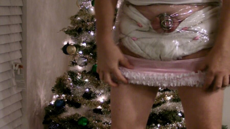 Free porn pics of kop4560000 wetting diaper in chastity cage by xmas tree 15 of 21 pics
