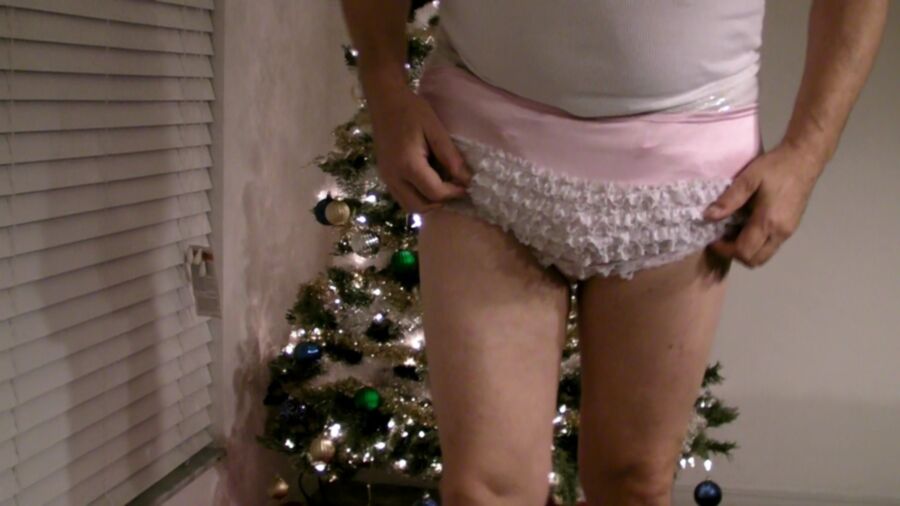 Free porn pics of kop4560000 wetting diaper in chastity cage by xmas tree 1 of 21 pics