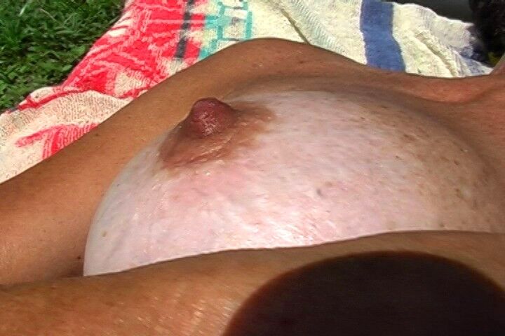 Free porn pics of Sexy Florida milf tits sunbathing 18 of 31 pics