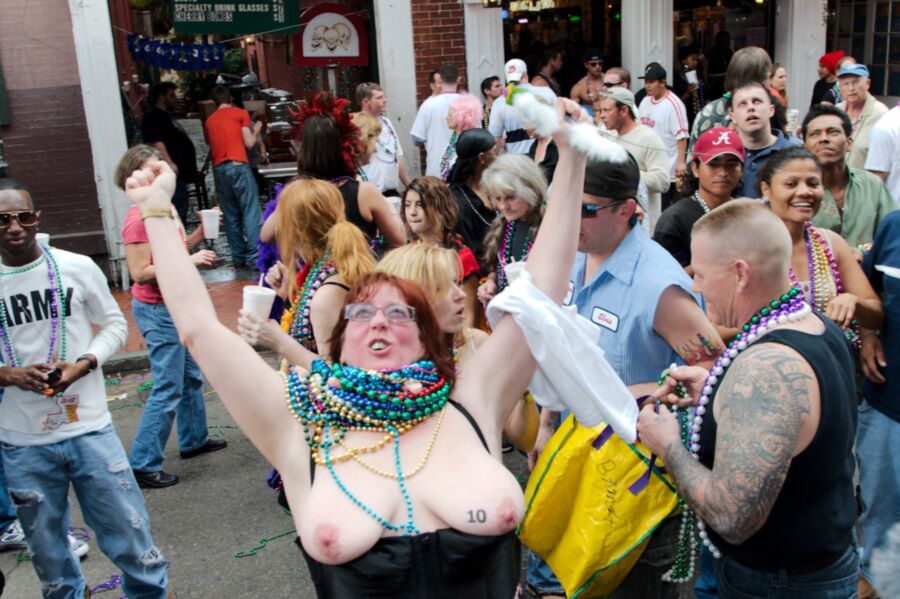 Free porn pics of Flashing Moms: Mardi Gras Tits 23 of 30 pics