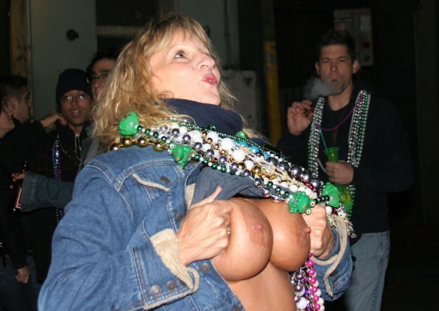 Free porn pics of Flashing Moms: Mardi Gras Tits 11 of 30 pics