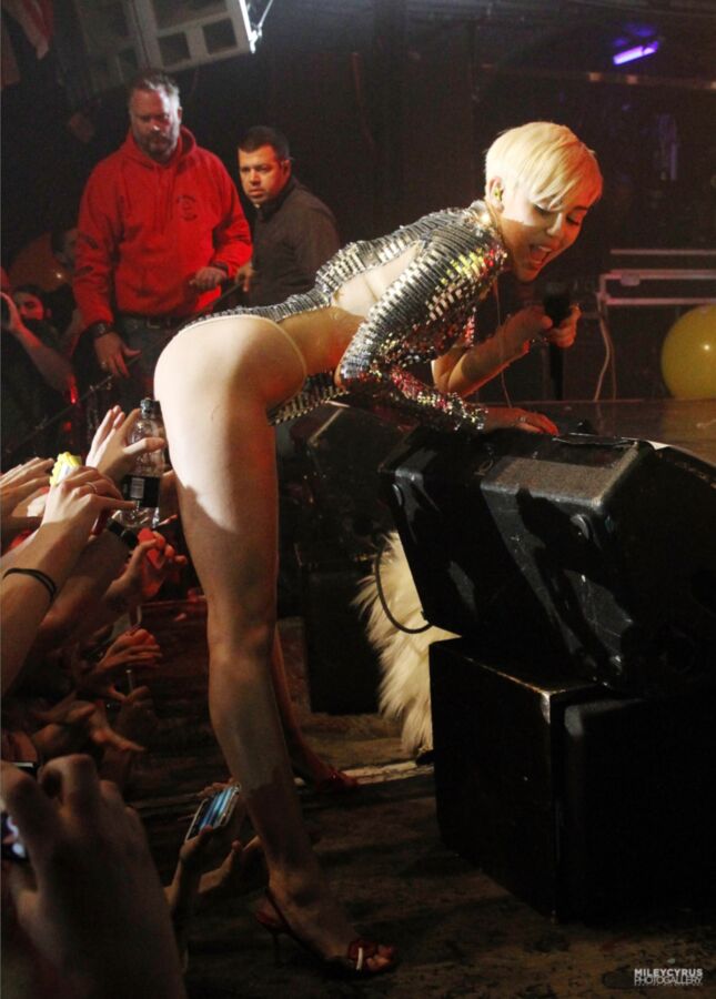 Free porn pics of Miley Cyrus Slutty Concert 5 of 5 pics