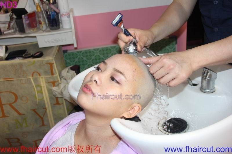 Free porn pics of Chinese girls get their heads shaved 17 of 54 pics