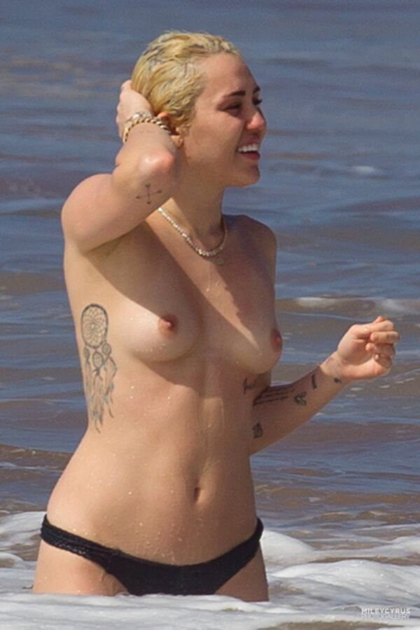 Free porn pics of  Miley Cyrus topless 10 of 10 pics