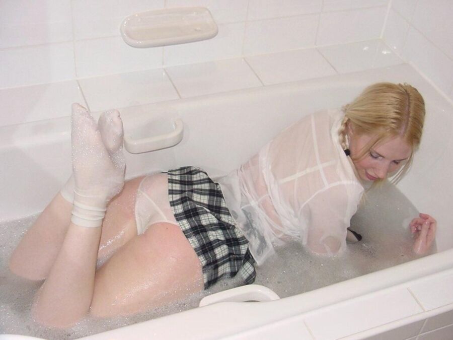 Free porn pics of Hazel Slowly Takes Off Her Soaking Wet Uniform 3 of 46 pics