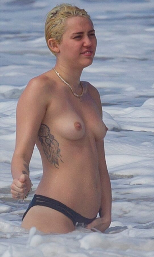 Free porn pics of A Very Fuckable Miley Cyrus 2 of 65 pics