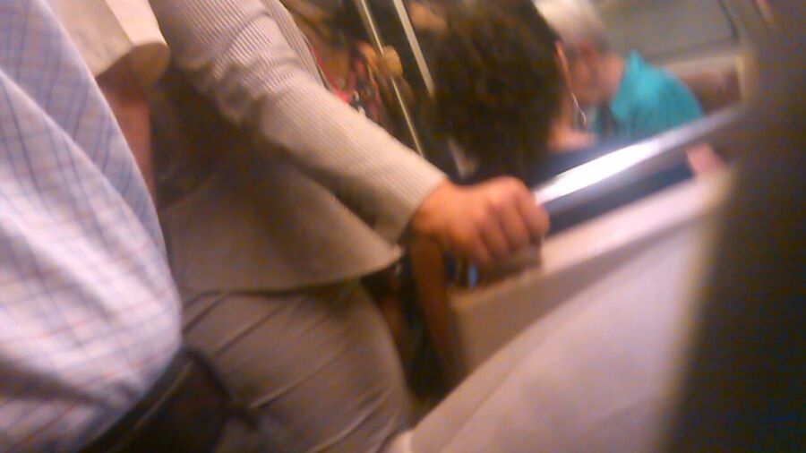 Free porn pics of non nude milf on subway with a tight dress nice n ass 2 of 5 pics