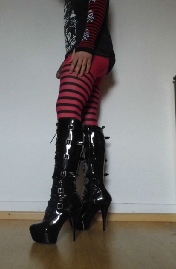 Free porn pics of Crossdressing Striped Pantyhose and Boots 9 of 17 pics
