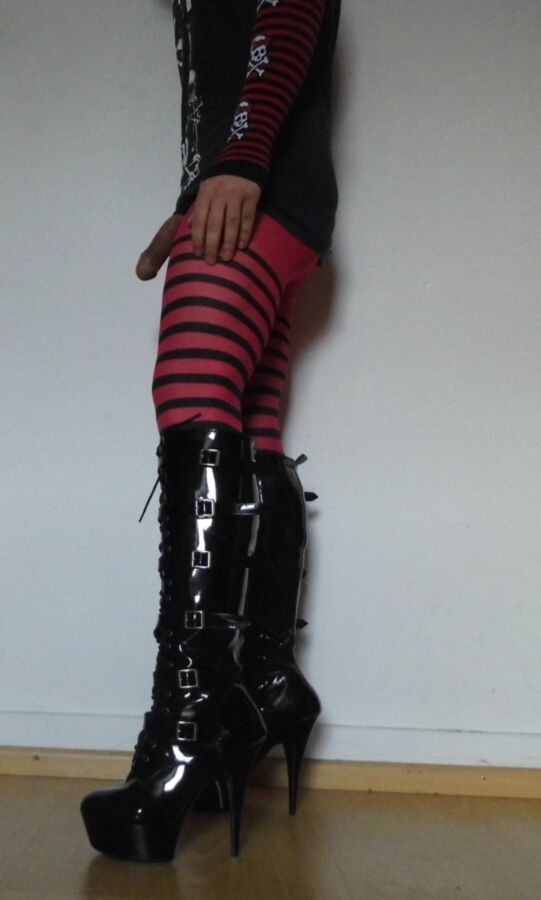 Free porn pics of Crossdressing Striped Pantyhose and Boots 4 of 17 pics