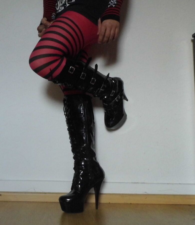 Free porn pics of Crossdressing Striped Pantyhose and Boots 14 of 17 pics