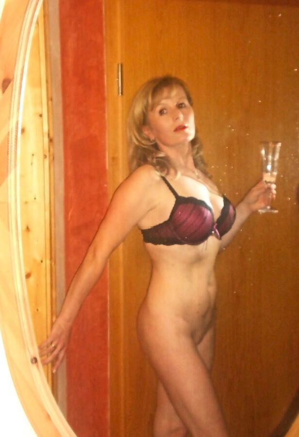 Free porn pics of Blonde German MILF Eva Poses in the Doorway 4 of 11 pics