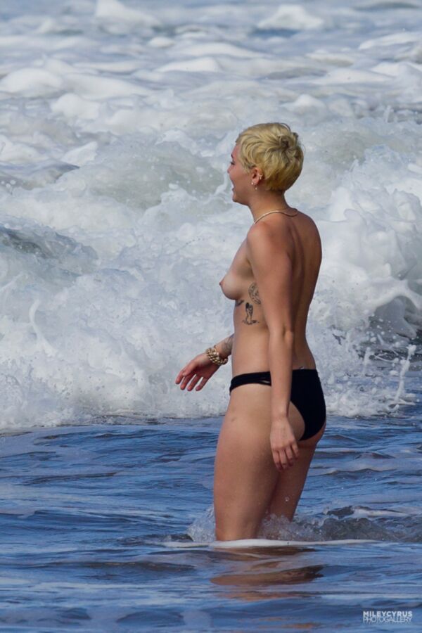 Free porn pics of M C - Topless in Hawaii 8 of 33 pics