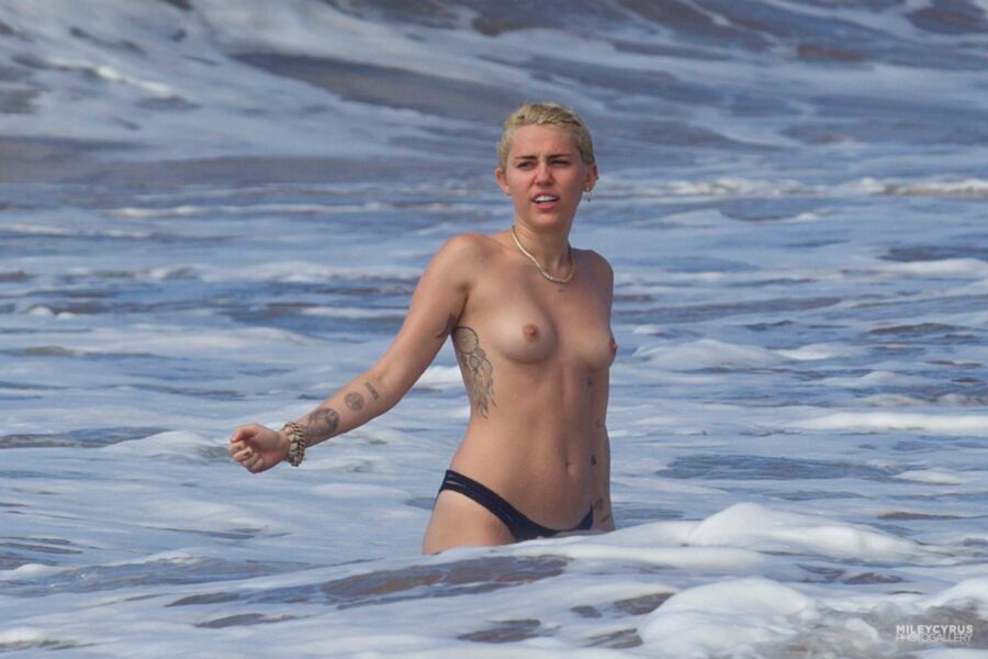 Free porn pics of M C - Topless in Hawaii 1 of 33 pics