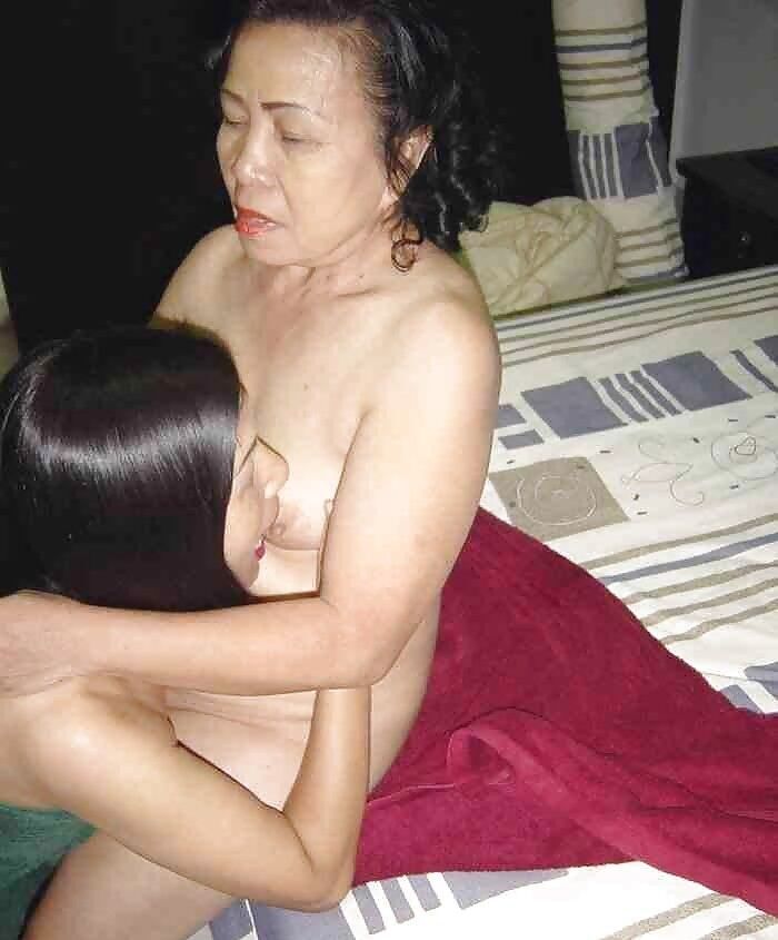 Free porn pics of asian mom and daughter 4 of 19 pics