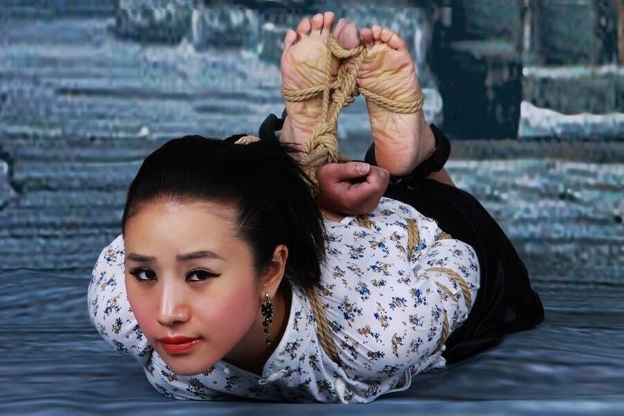 Free porn pics of Chinese GIrls Tightly Hogtied 24 of 46 pics