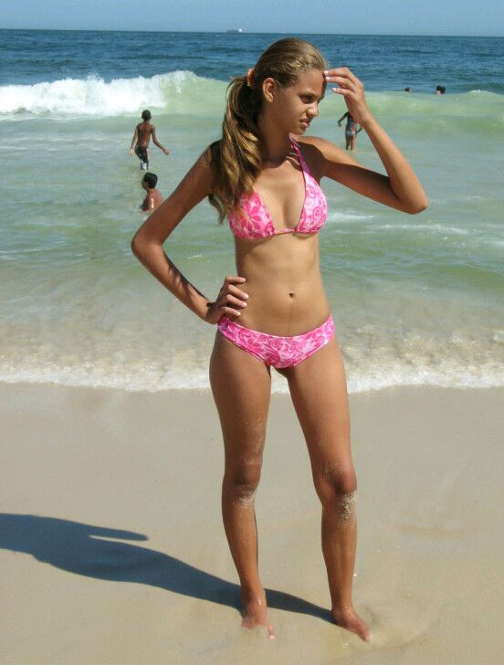 Free porn pics of Stacked Brazilian Teen Showing Oiff On The Beach In A Bikini   10 of 22 pics