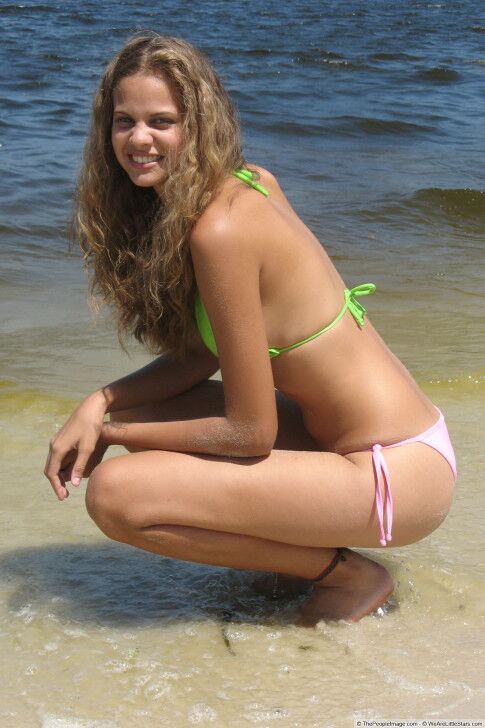 Free porn pics of Stacked Brazilian Teen Showing Oiff On The Beach In A Bikini   14 of 22 pics