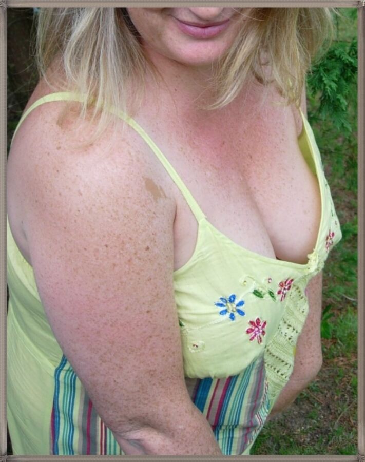 Free porn pics of Milf teasing in yellow dress outdoors 11 of 20 pics