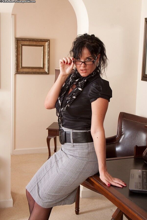 Free porn pics of Danielle: classy in glasses and backseamed hose 7 of 139 pics