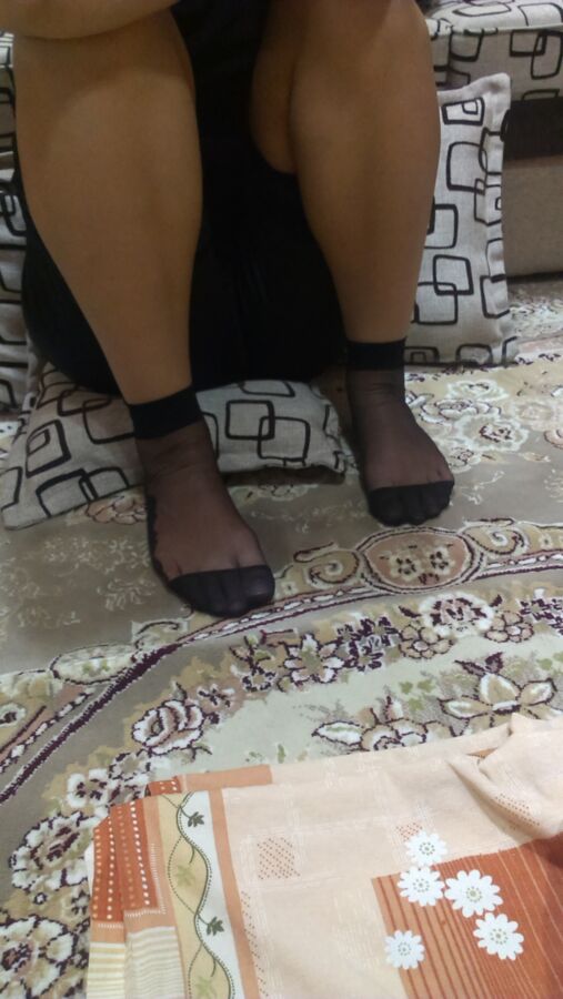 Free porn pics of persian chick give footjob in black nylon socks 19 of 50 pics