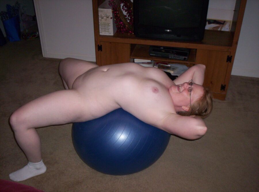 Free porn pics of charity exercises on her blue ball 5 of 8 pics