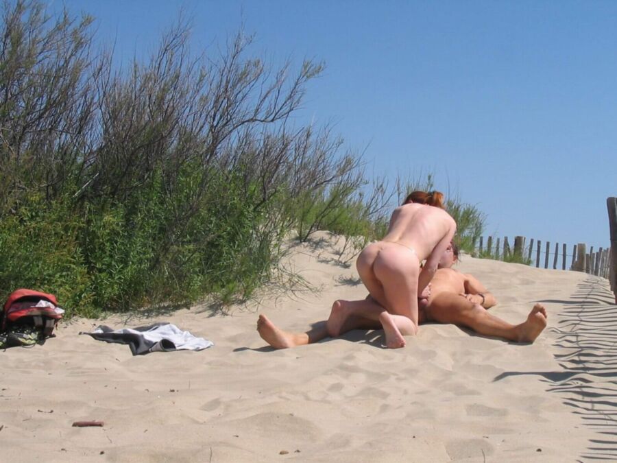 Free porn pics of Naughty Nudists: Candid Sex on the Beach 19 of 112 pics