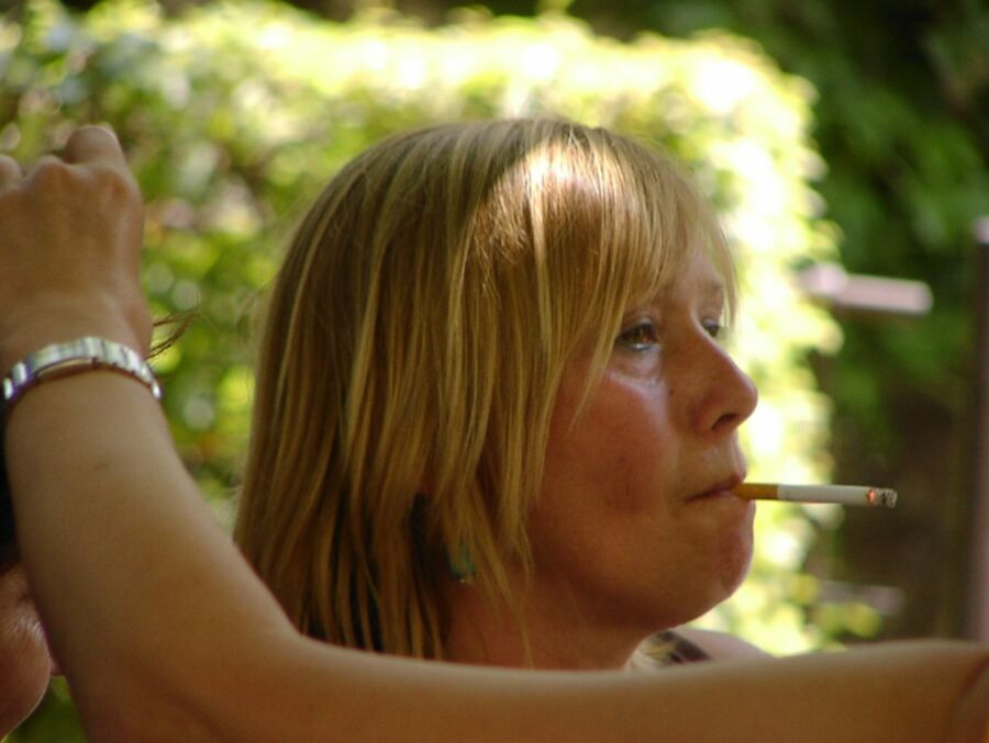 Free porn pics of EuroSmoke Candid Women Smoking 21 of 250 pics