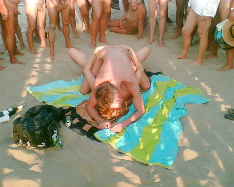 Free porn pics of Naughty Nudists: Candid Sex on the Beach 13 of 112 pics