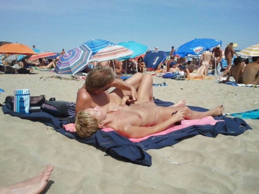 Free porn pics of Naughty Nudists: Candid Sex on the Beach 12 of 112 pics