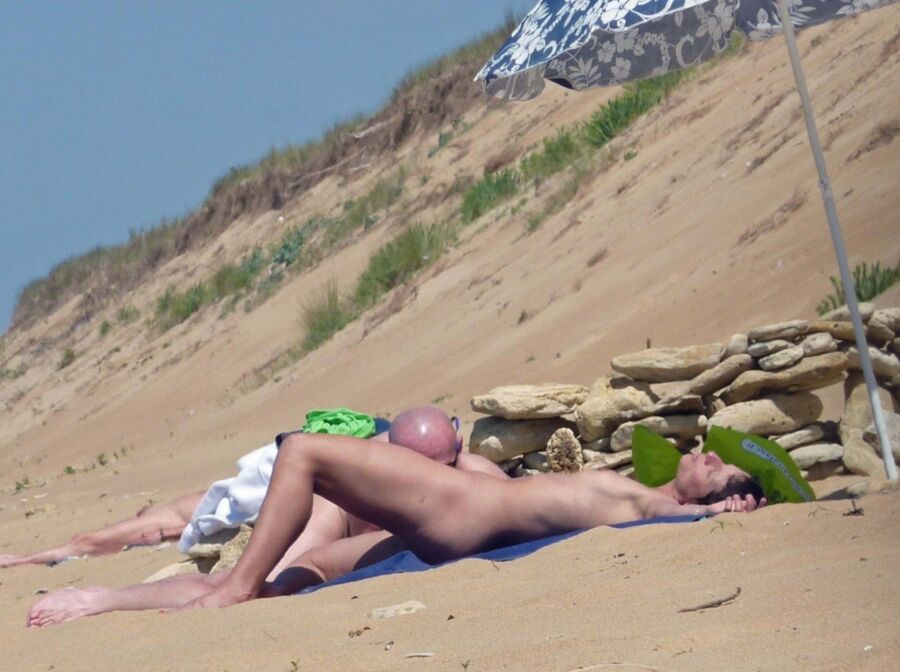 Free porn pics of Naughty Nudists: Candid Sex on the Beach 24 of 112 pics