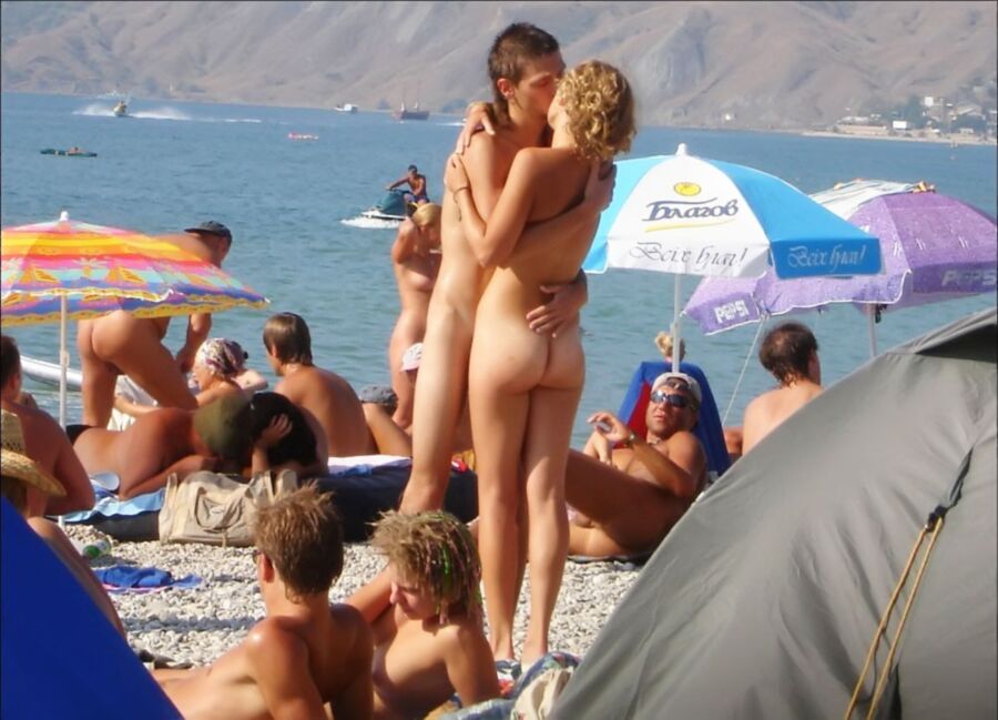 Free porn pics of Naughty Nudists: Candid Sex on the Beach 3 of 112 pics