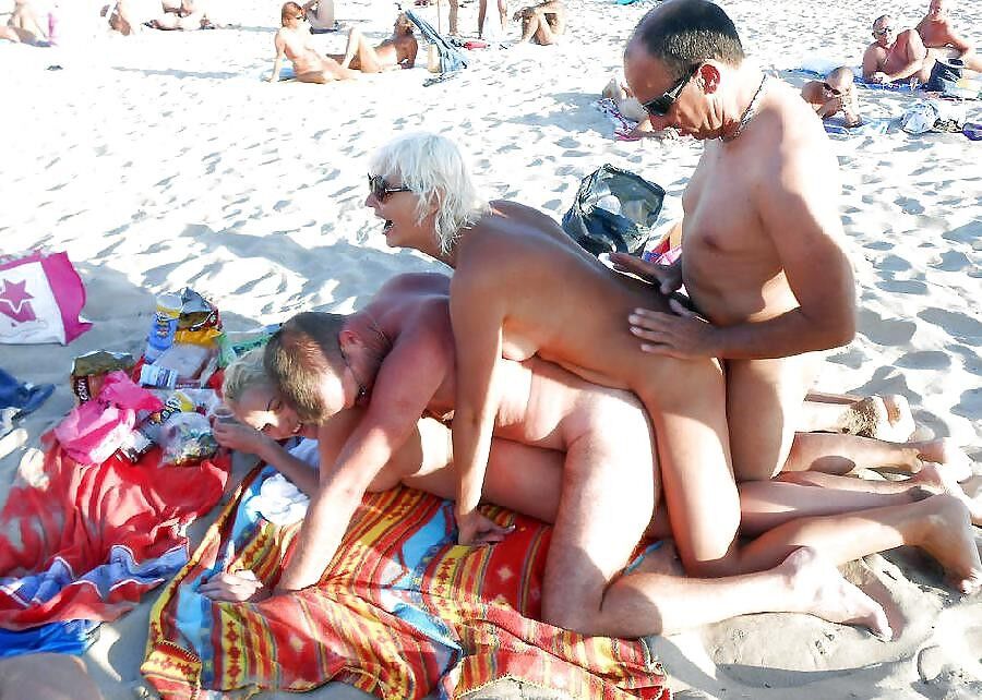 Free porn pics of Naughty Nudists: Candid Sex on the Beach 4 of 112 pics