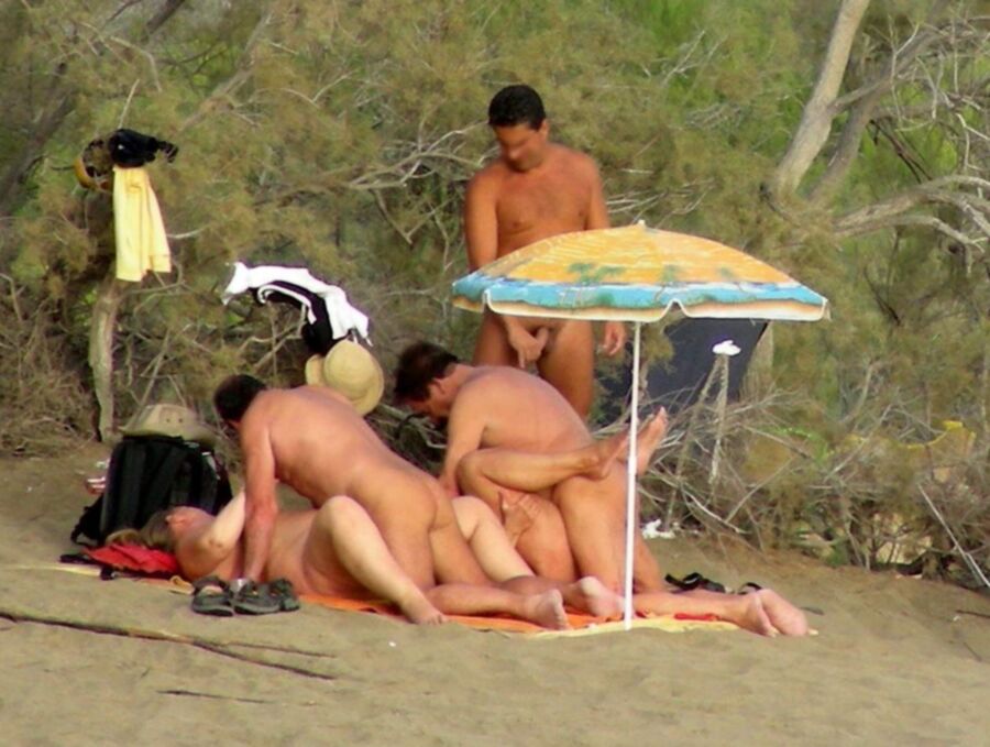 Free porn pics of Naughty Nudists: Candid Sex on the Beach 10 of 112 pics