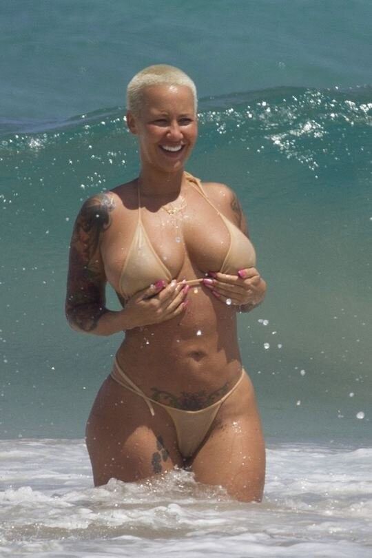 Free porn pics of Amber Rose Topless Tits Nipples Ass Bikini Beach Celebrities 19 of 23 pics